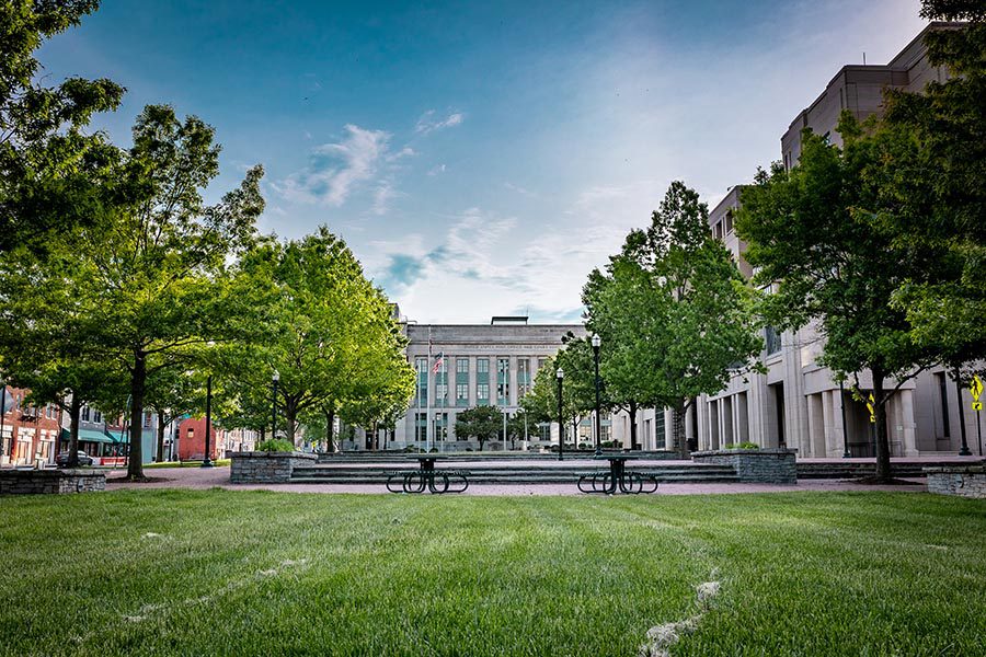 Lexington, KY Insurance - Stone Buildings in Lexington, Kentucky With a Broad Green Courtyard and Trees